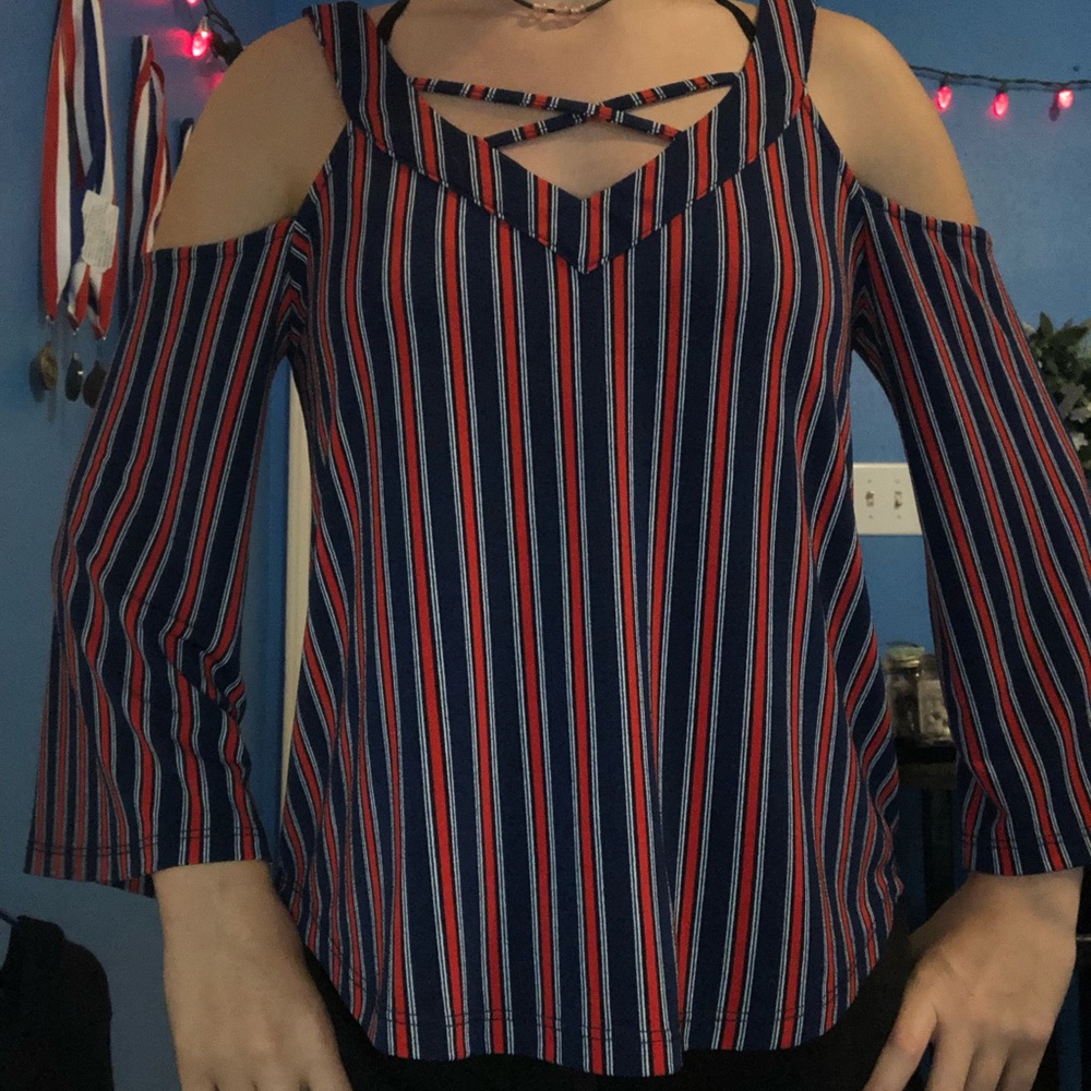 Striped red and blue shirts with shoulder cut outs